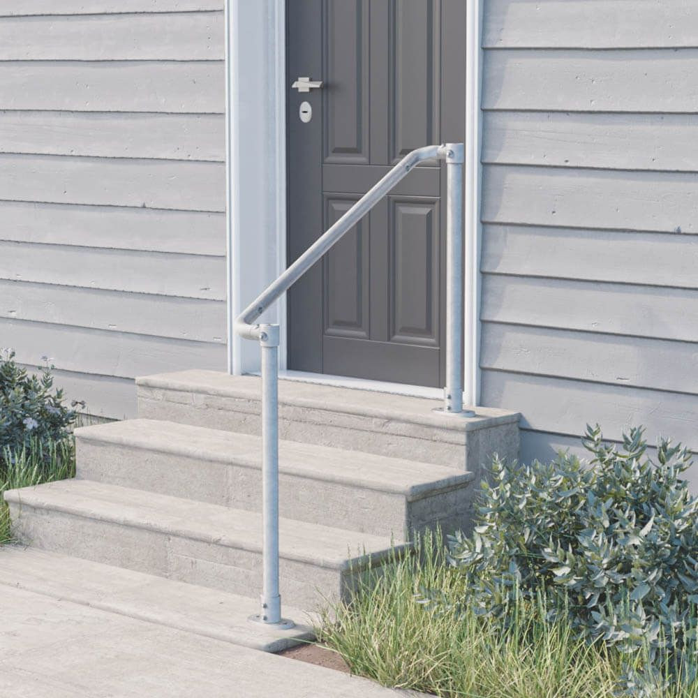 Floor mounted handrail with rounded ends