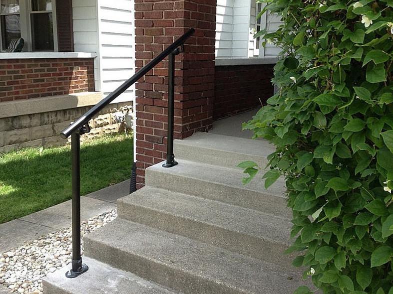 black handrail outside the house